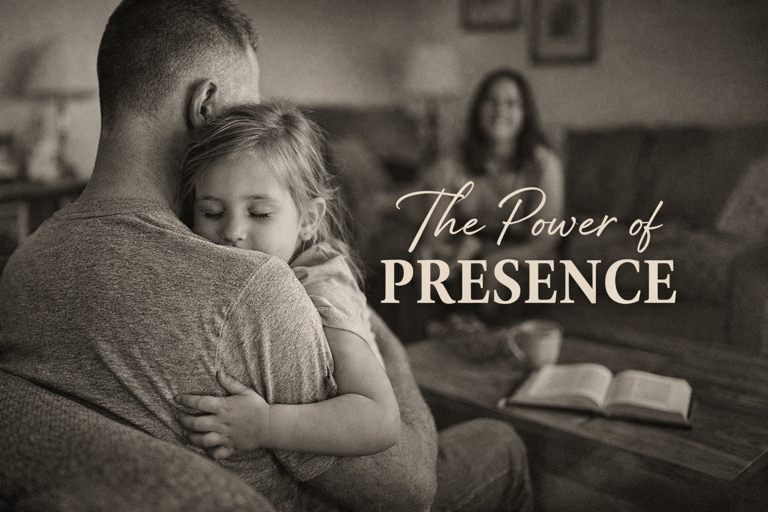 A dad hugging his daughter